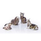 Four Royal Crown Derby paperweights decorated in the Imari colour palette in the form of animals,