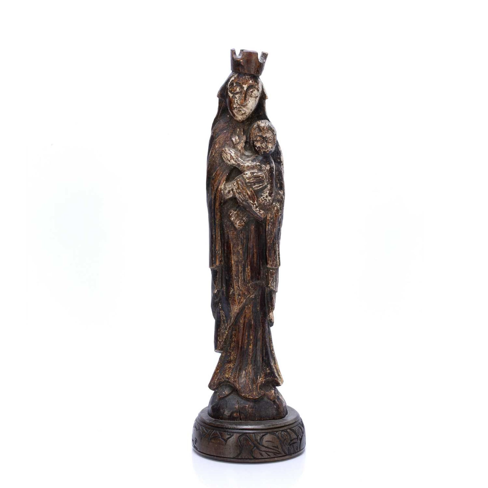 Carved and painted figure of Madonna European, 17th Century style, on a later base, 48cmLosses to