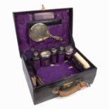 Mappin & Webb vanity or travelling case the outer leather case containing silver topped dressing