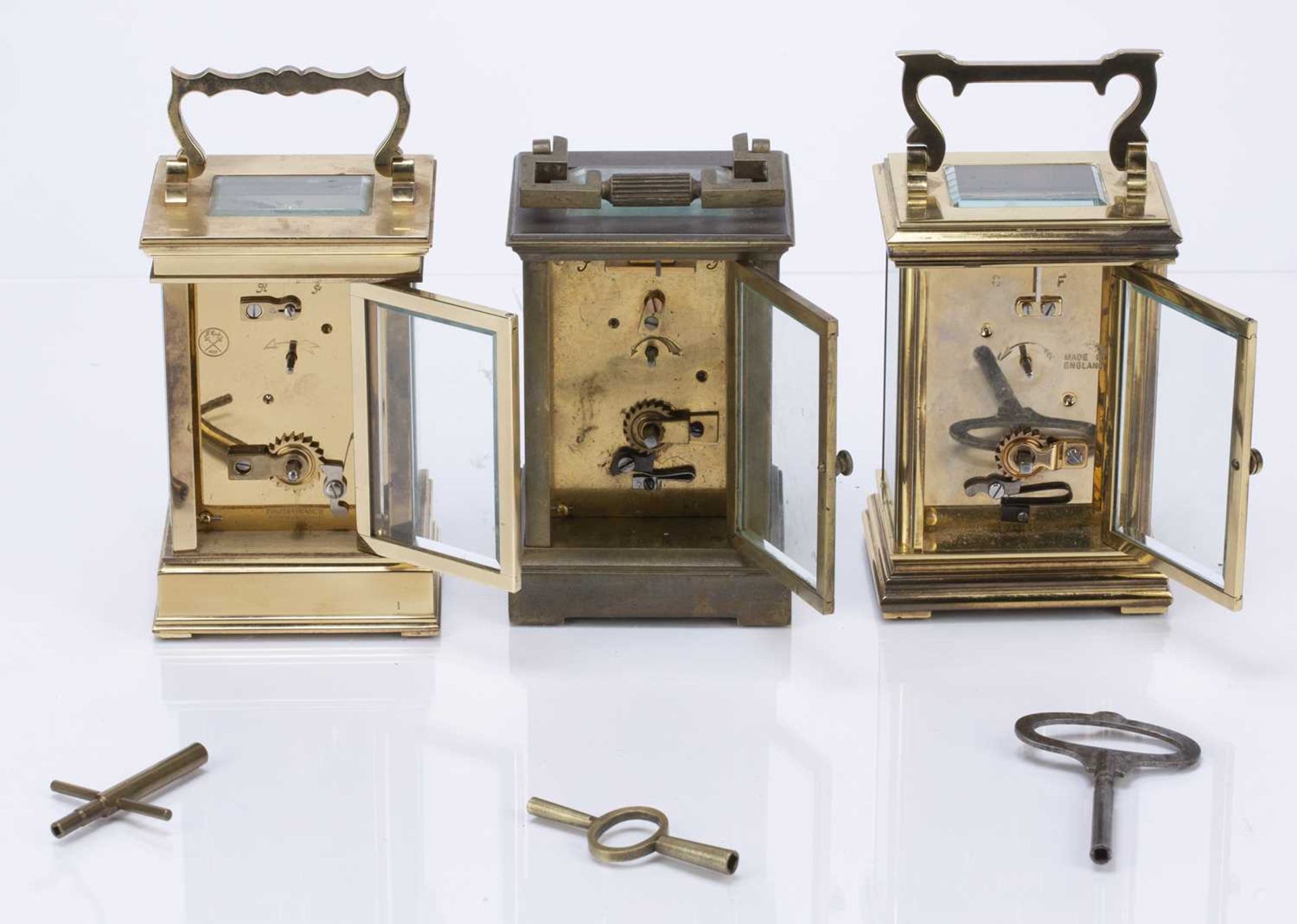 Three brass cased carriage clocks early/mid 20th Century, one made in France, with white enamel - Image 3 of 4