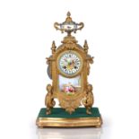 French mantel clock 19th Century, gilt painted, the painted porcelain clock face with Roman