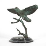 Bronze model of a bird Early 20th Century, with green patination and black marble base, 21cm