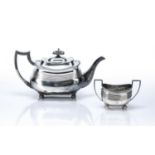 Georgian silver teapot and similar twin handled silver sucrier the teapot decorated with two