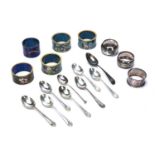 Collection of items consisting of: Five cloisonné enamel napkin rings, three silver napkin rings and