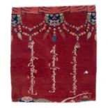 Mongolian pillar rug of red ground, 116cm x 103cmWith a hole and in half.