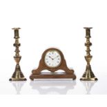 Lashmore of Oswestry walnut mantel clock with marquetry decoration, 17cm high and a pair of brass
