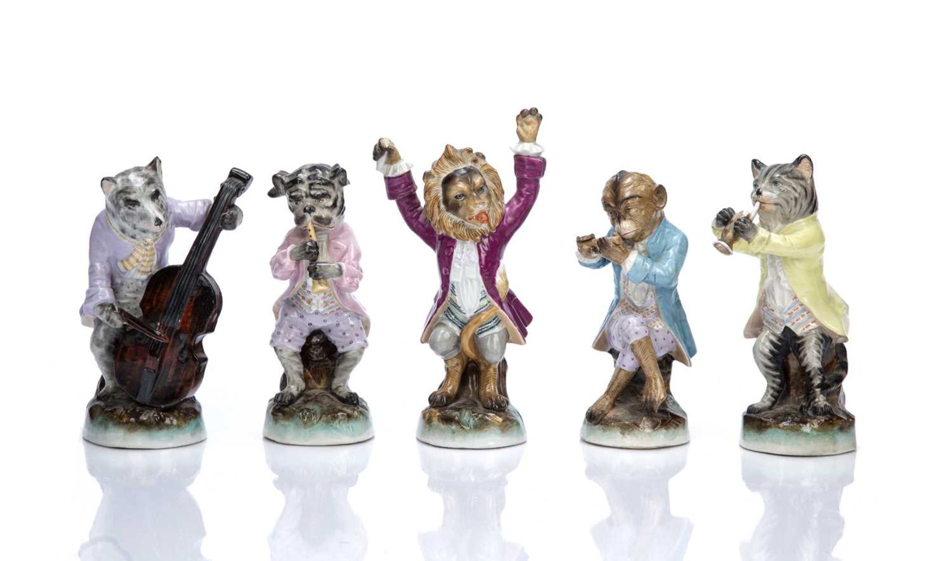 Group of ceramic figures late 19th/early 20th Century, consisting of five animal band type pieces,