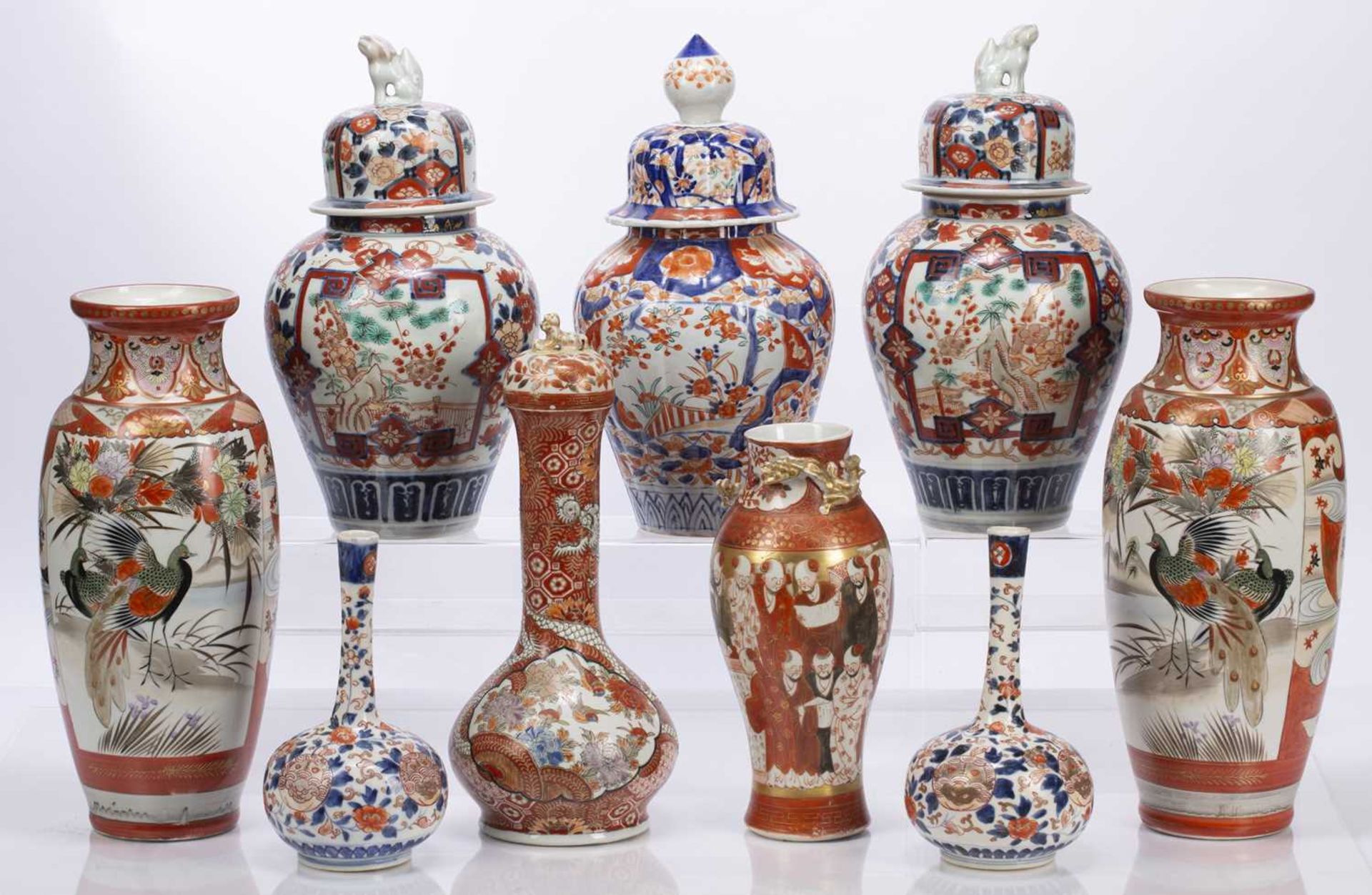 Group of nine Imari and Kutani vases Japanese, comprising of a pair of lidded vases surmounted - Image 2 of 5