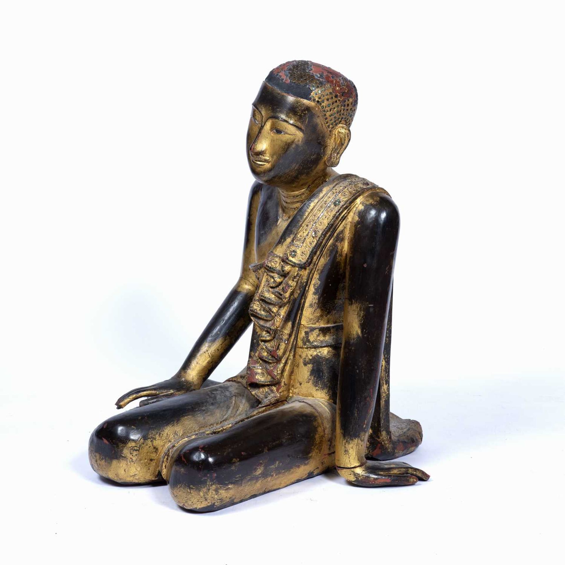 Wooden figure South East Asian, depicted seated with robes draped over one arm, with original traces - Image 3 of 5