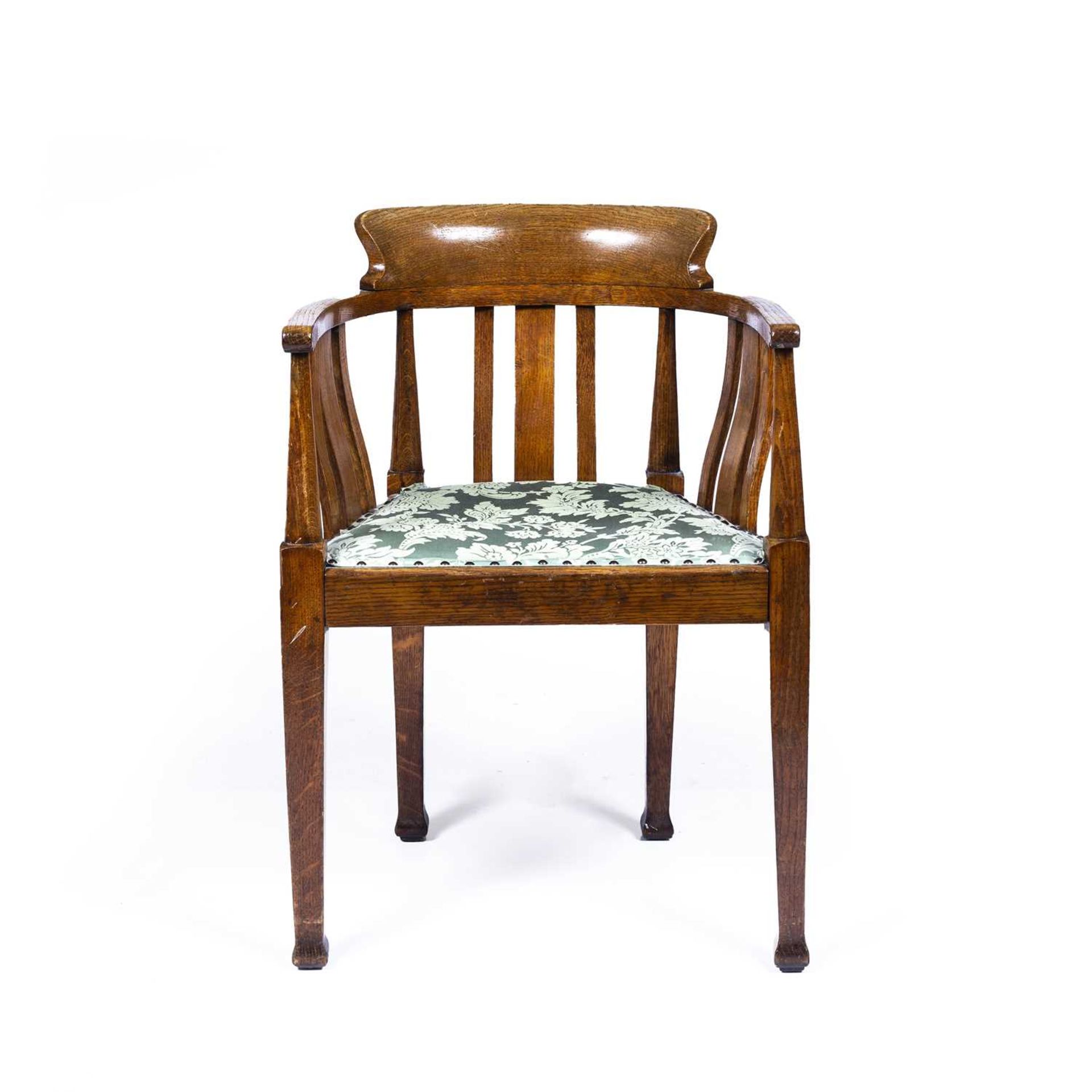 Attributed to Ambrose Heal (1872-1959) oak, armchair with green floral upholstered seat, unmarked,
