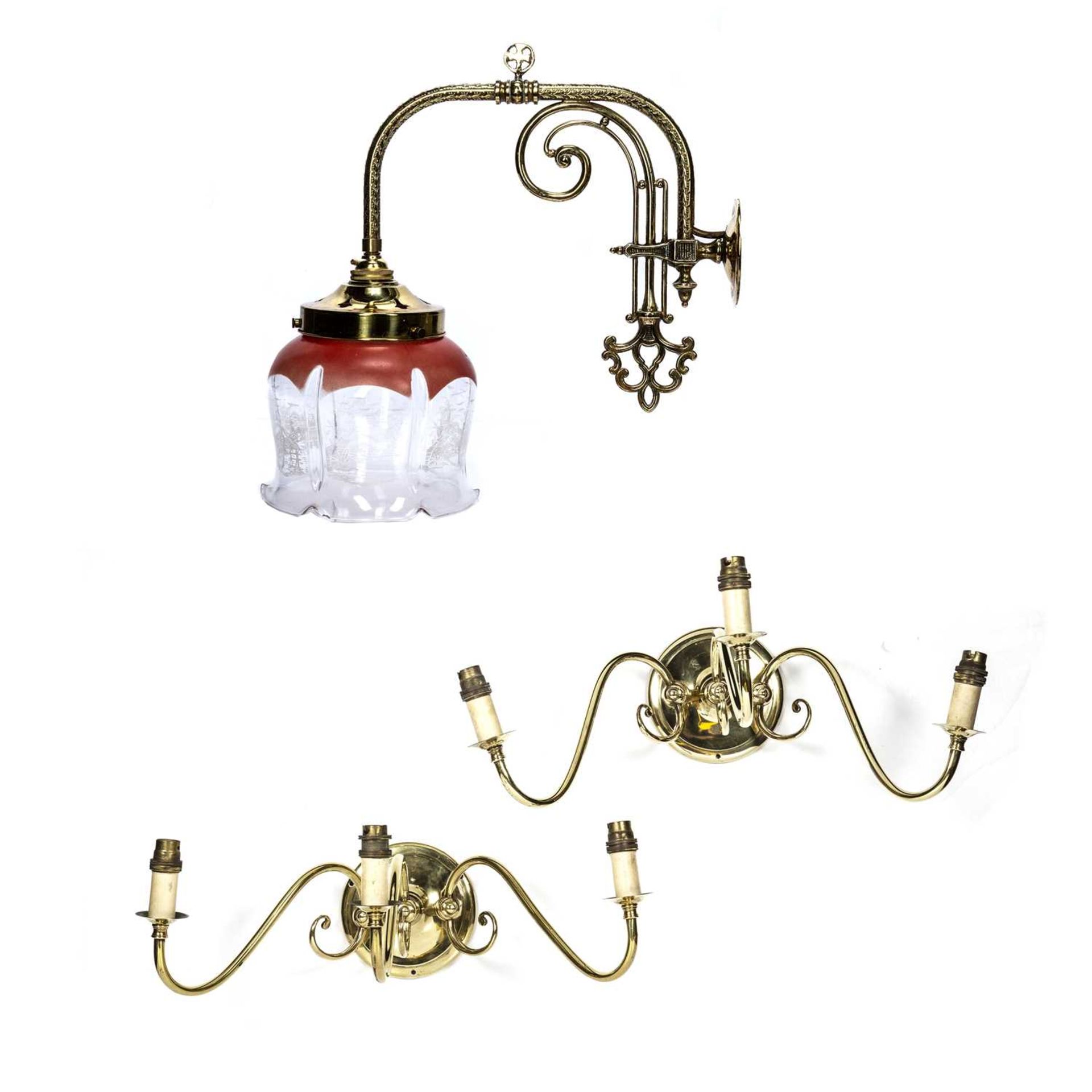 Converted gas lamp with etched shade and a pair of three branch brass wall lights, 50cm across