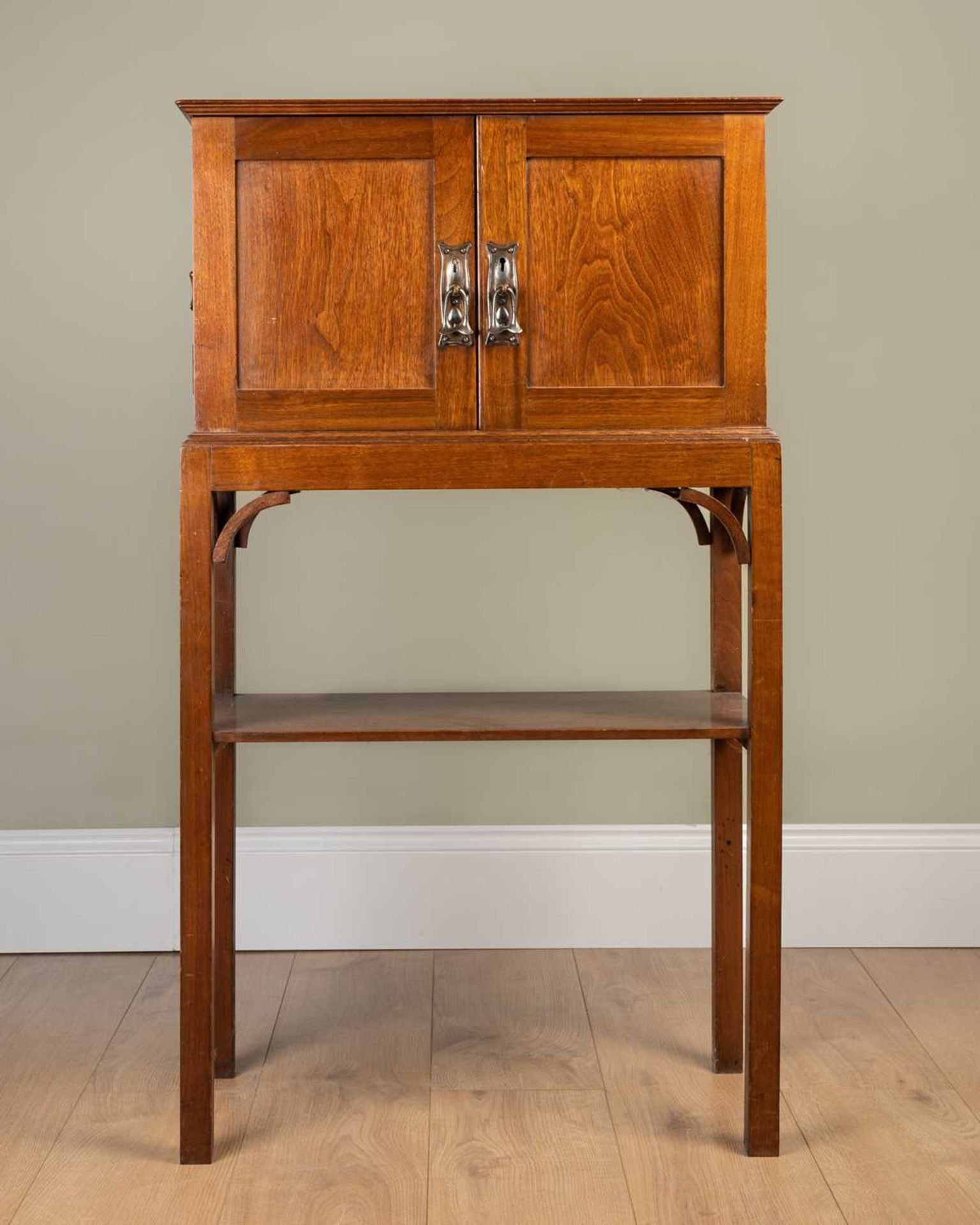 A late 19th / early 20th century mahogany collectors cabinet on stand, with fitted interior, the