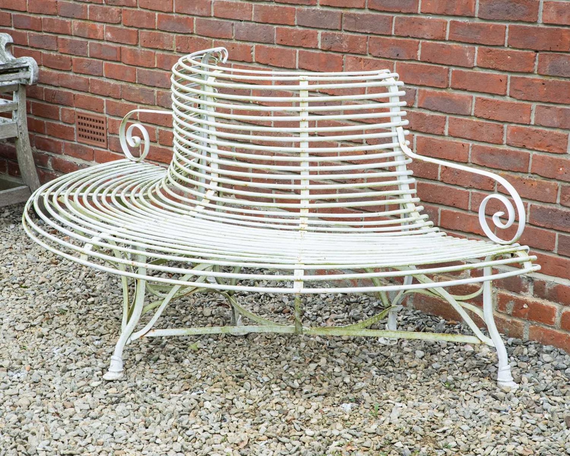 A white painted wrought iron semi-circular tree bench with scrolling arms, approximately 183cm - Image 2 of 2