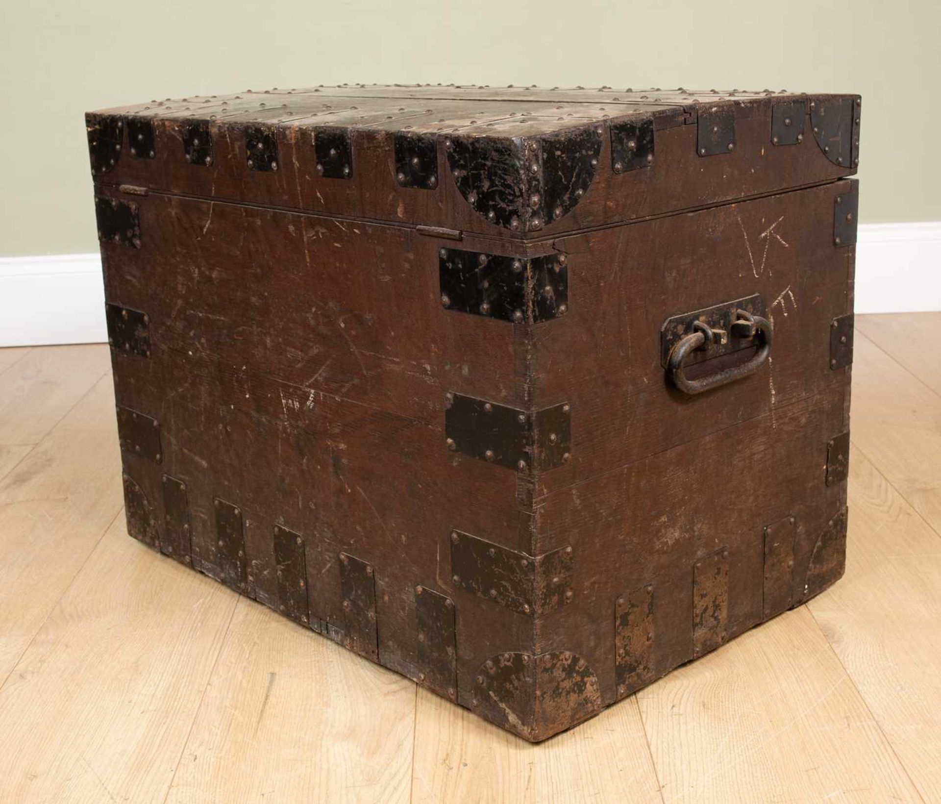 An antique oak iron-bound oak silver chest with carrying handles to the side, the baize lined - Image 2 of 4