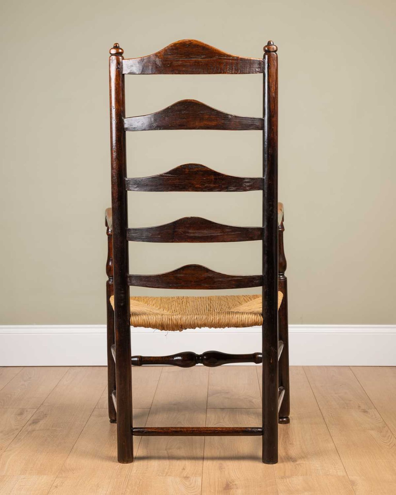 An ash framed ladder back chair with rush seat, stamped 'WA' to the seat back, on turned supports, - Image 3 of 3