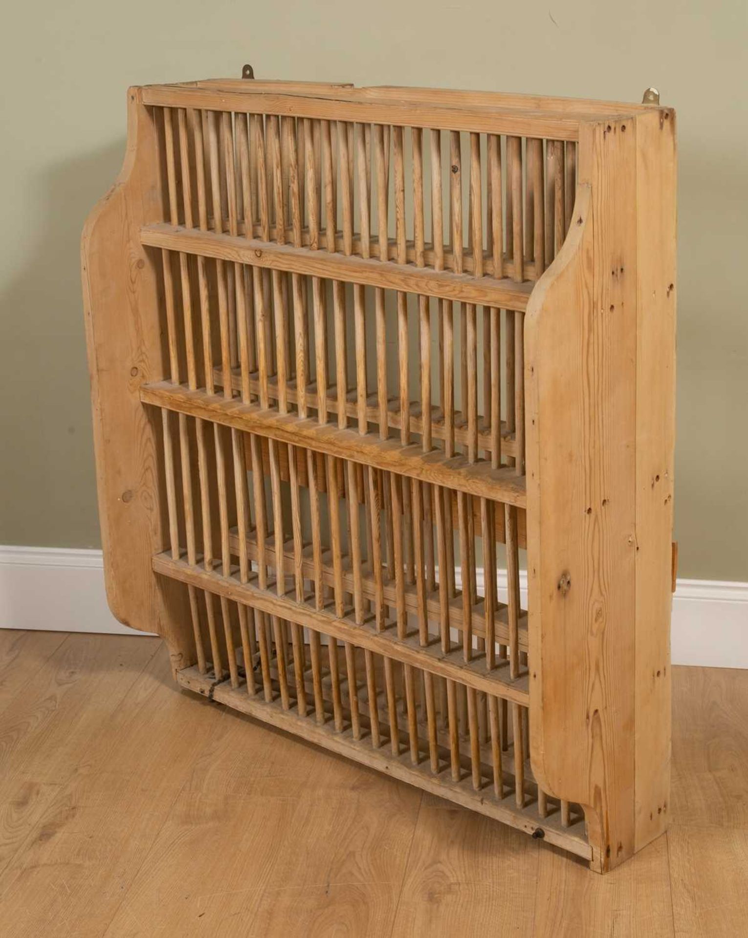 An Edwardian pine plate rack, 95cm wide, 32cm deep, 112cm highSome losses to the sides, possibly - Image 2 of 2