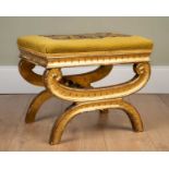 An antique giltwood stool, with tapestry embroidered top, 50cm wide, 38cm deep, 42cm highChips and