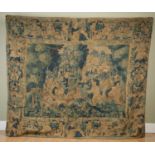 A 17th or 18th century Flemish tapestry depicting courtly figures hunting a stag before a large