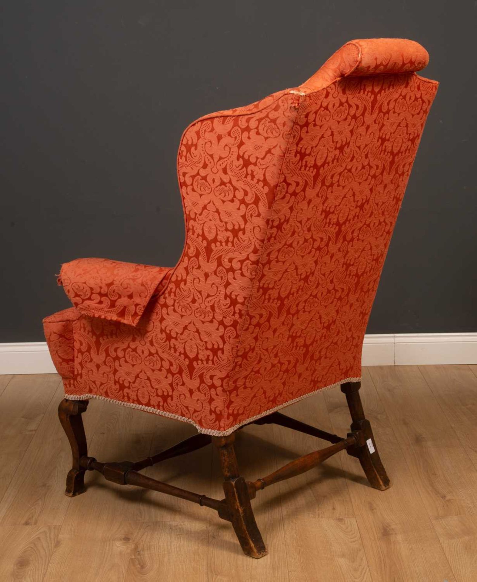 A Georgian mahogany high wingback armchair on scrolling supports united by an H-frame stretcher, - Image 2 of 5