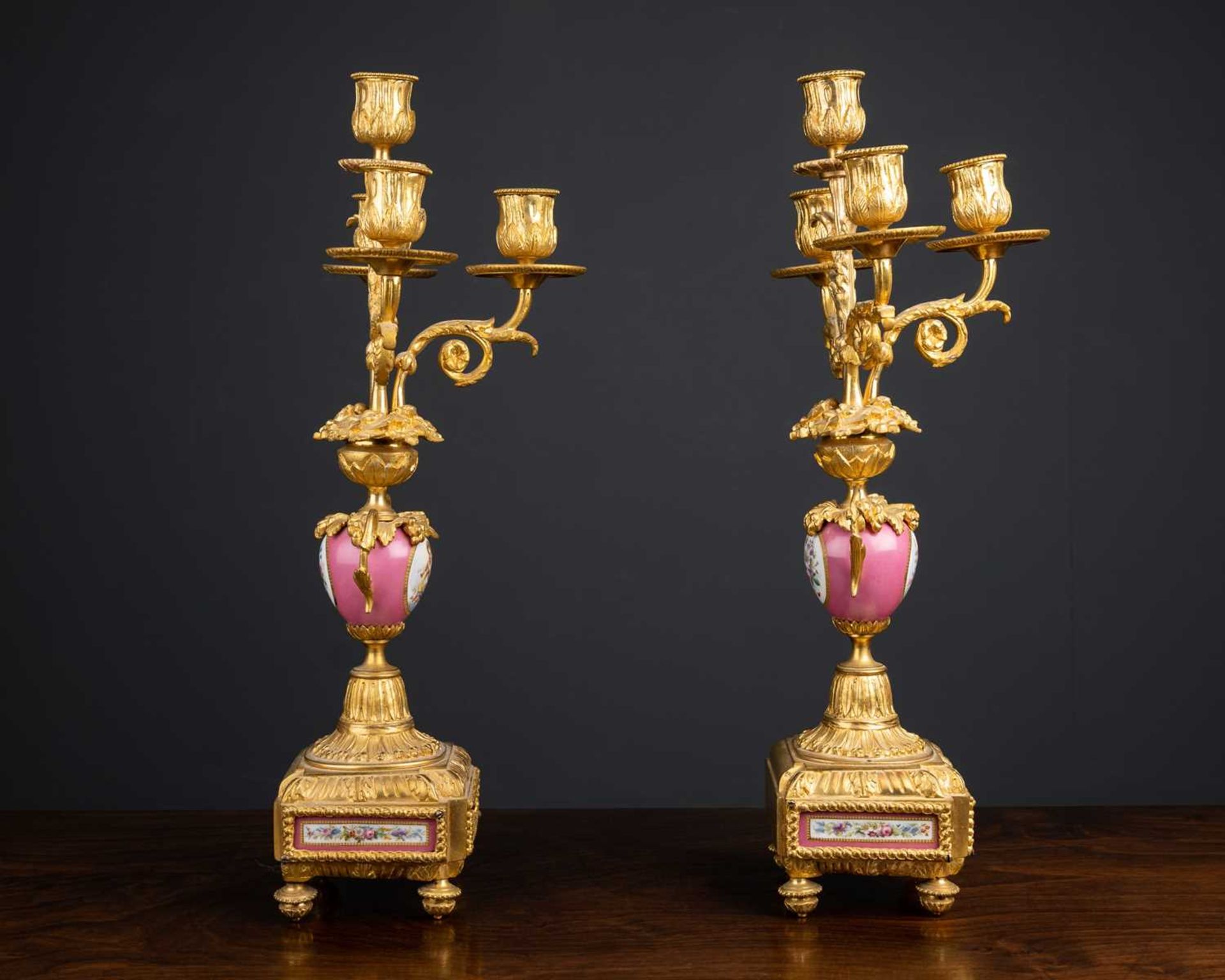 A pair of ormolu and porcelain candelabra, the pink porcelain bodies with cherub panel, 43cm high ( - Image 6 of 6