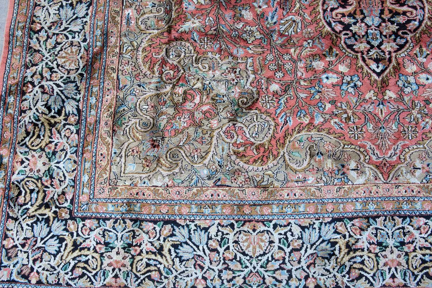A 20th century Indian Kashmir silk rug with a detailed foliate decoration, 210cm x 208cmIn good - Image 2 of 4