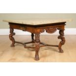 An Italian walnut low occasional table with marble top, with giltwood carved cherub and swag