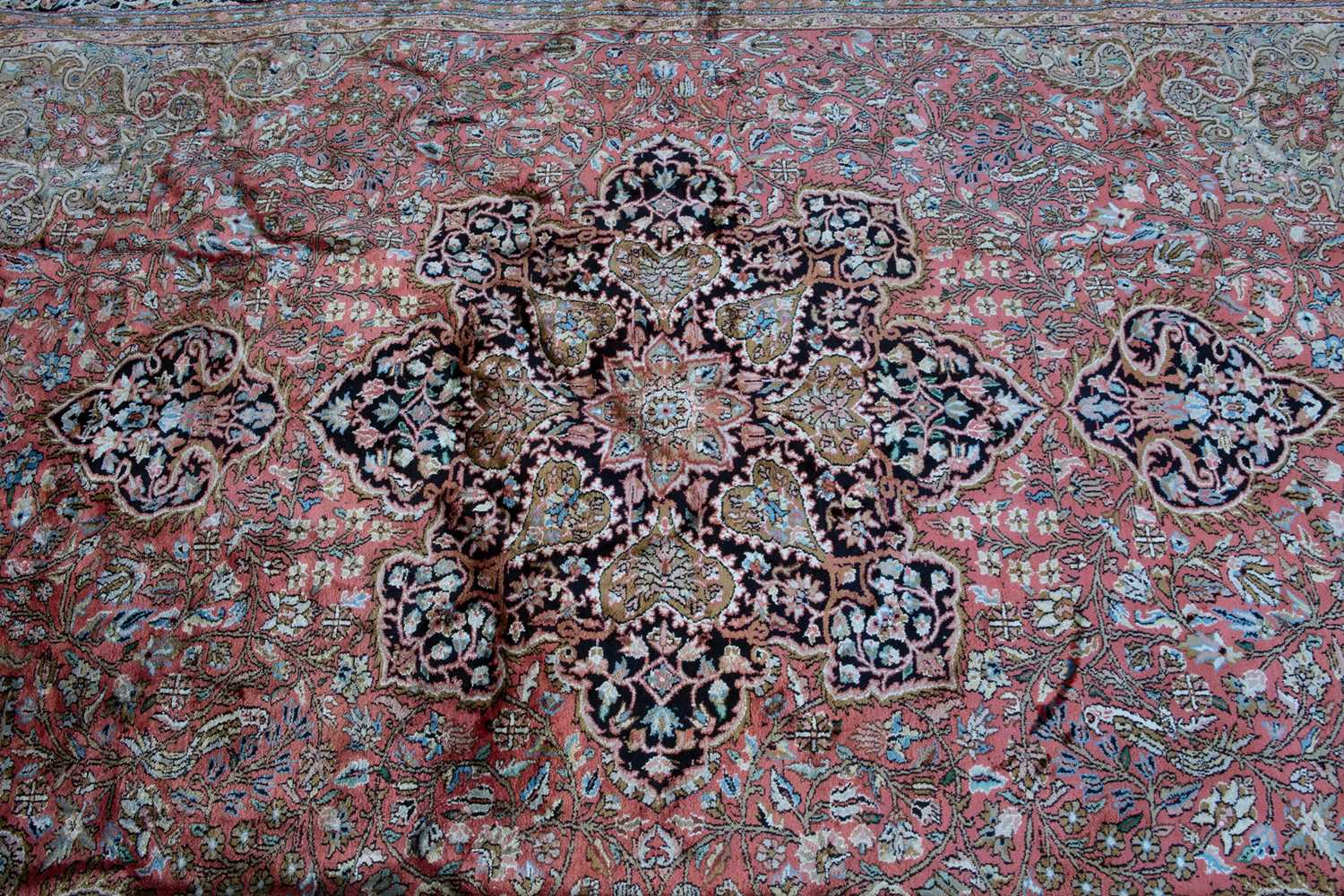 A 20th century Indian Kashmir silk rug with a detailed foliate decoration, 210cm x 208cmIn good - Image 3 of 4