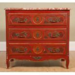 A red ground Jappaned marble-topped hardwood commode, with three drawers, panelled sides and on