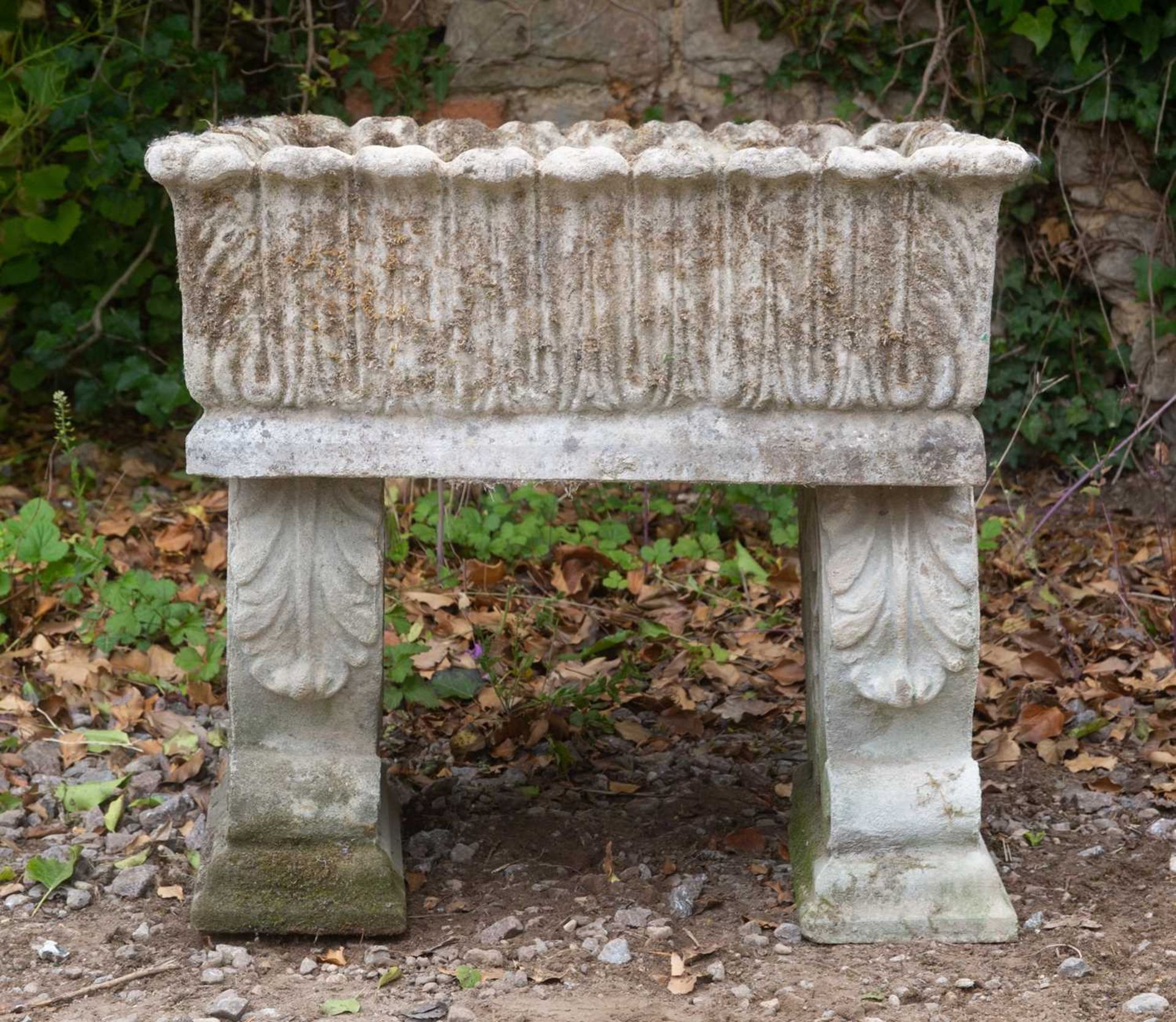 A cast reconstituted stone square planter, with acanthus leaf decoration, on scrolling supports, - Image 2 of 4