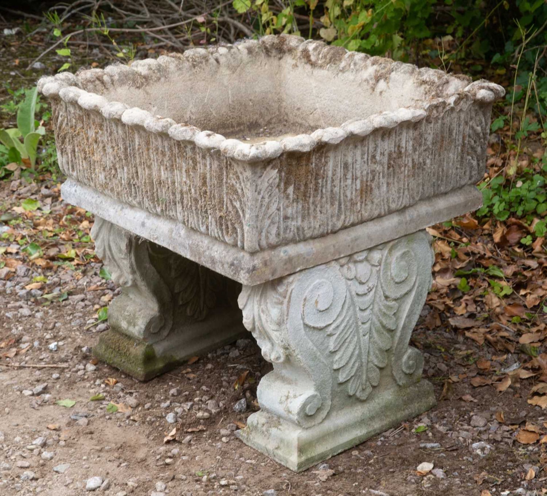 A cast reconstituted stone square planter, with acanthus leaf decoration, on scrolling supports, - Image 3 of 4