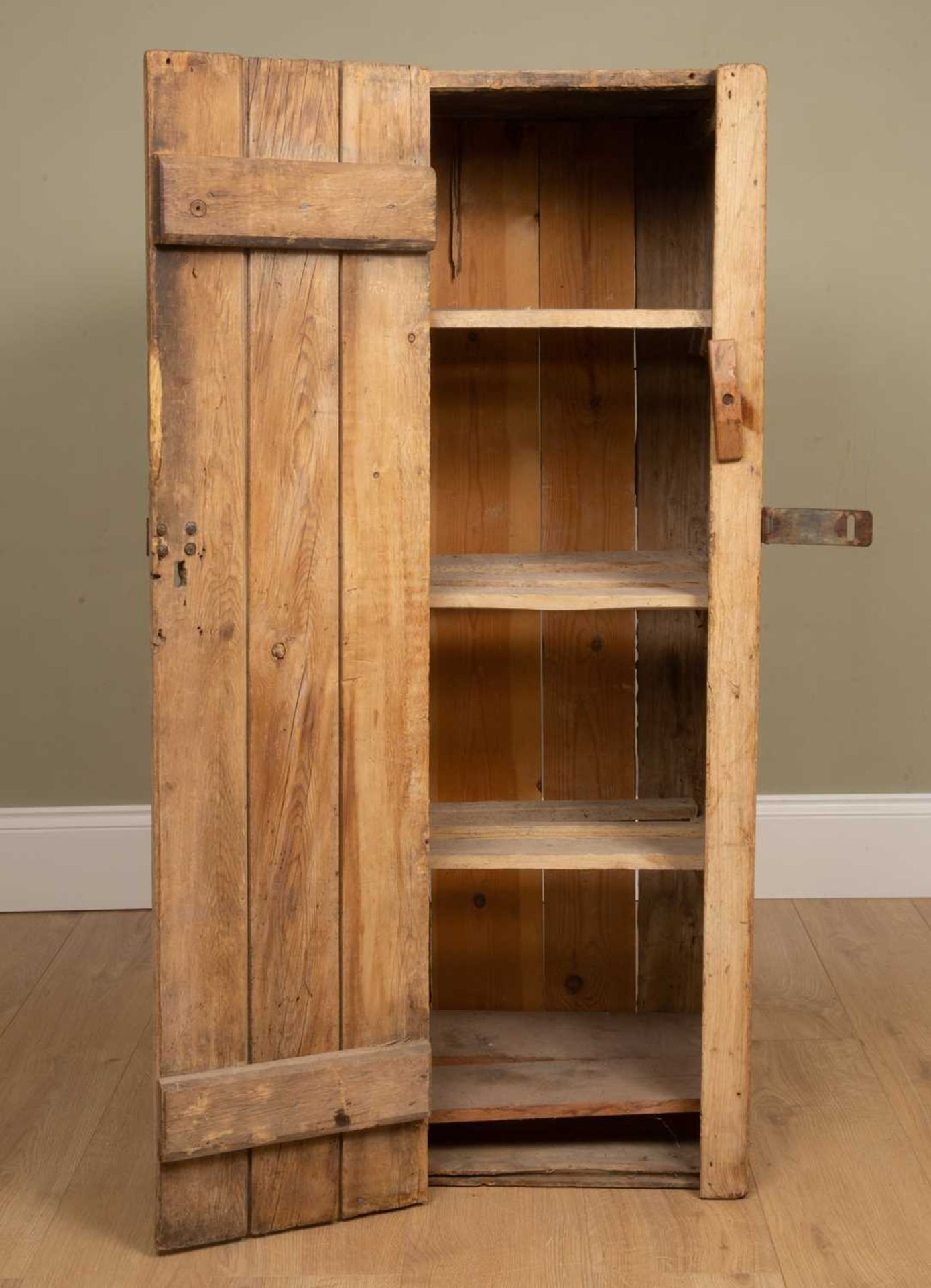 A rustic pine cupboard with iron hinges and lock plate, 44cm wide x 38.5cm deep x 123cm highDents, - Image 2 of 3
