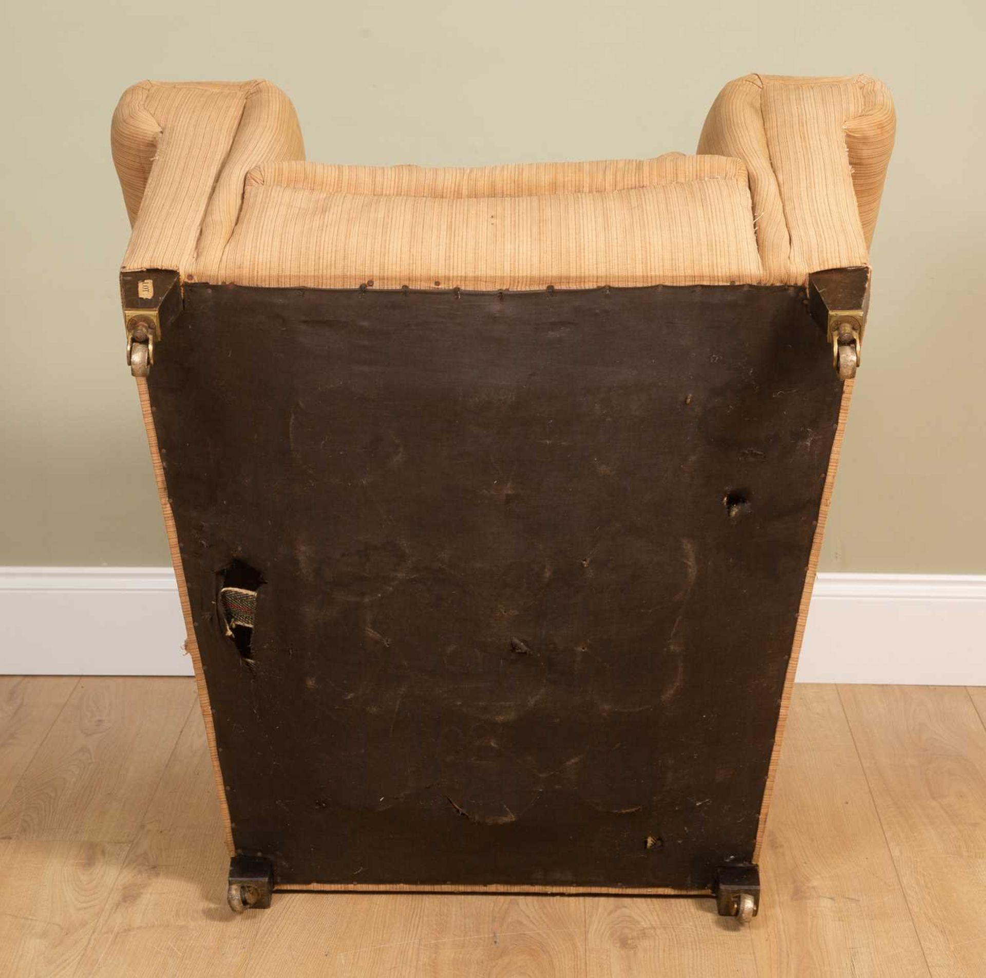 An Edwardian deep armchair, with square tapering front legs and brass casters, 90cm wide, 106cm - Image 6 of 6