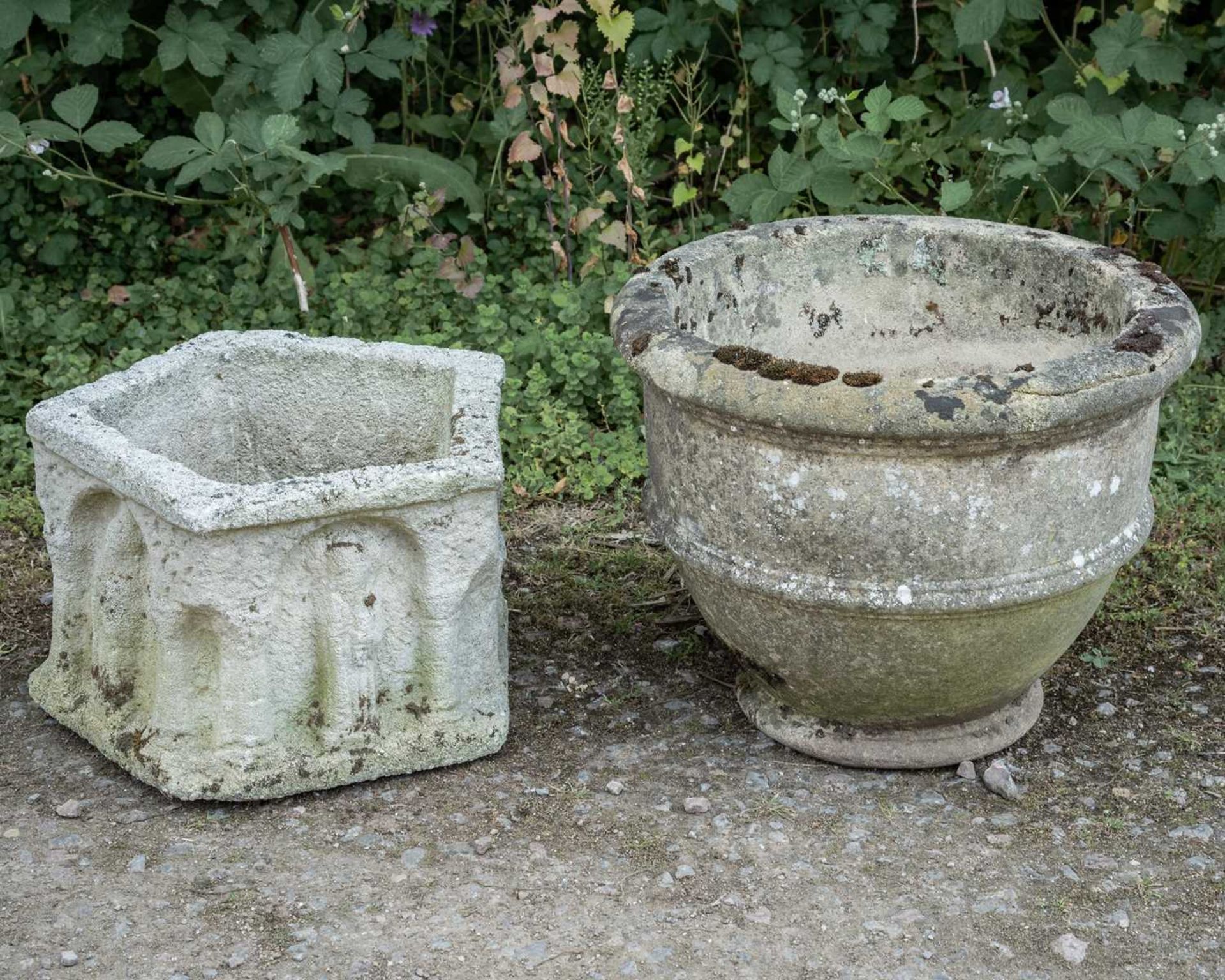 A circular cast reconstituted stone garden planter with banded ornament, 53cm diameter x 43cm - Image 2 of 3