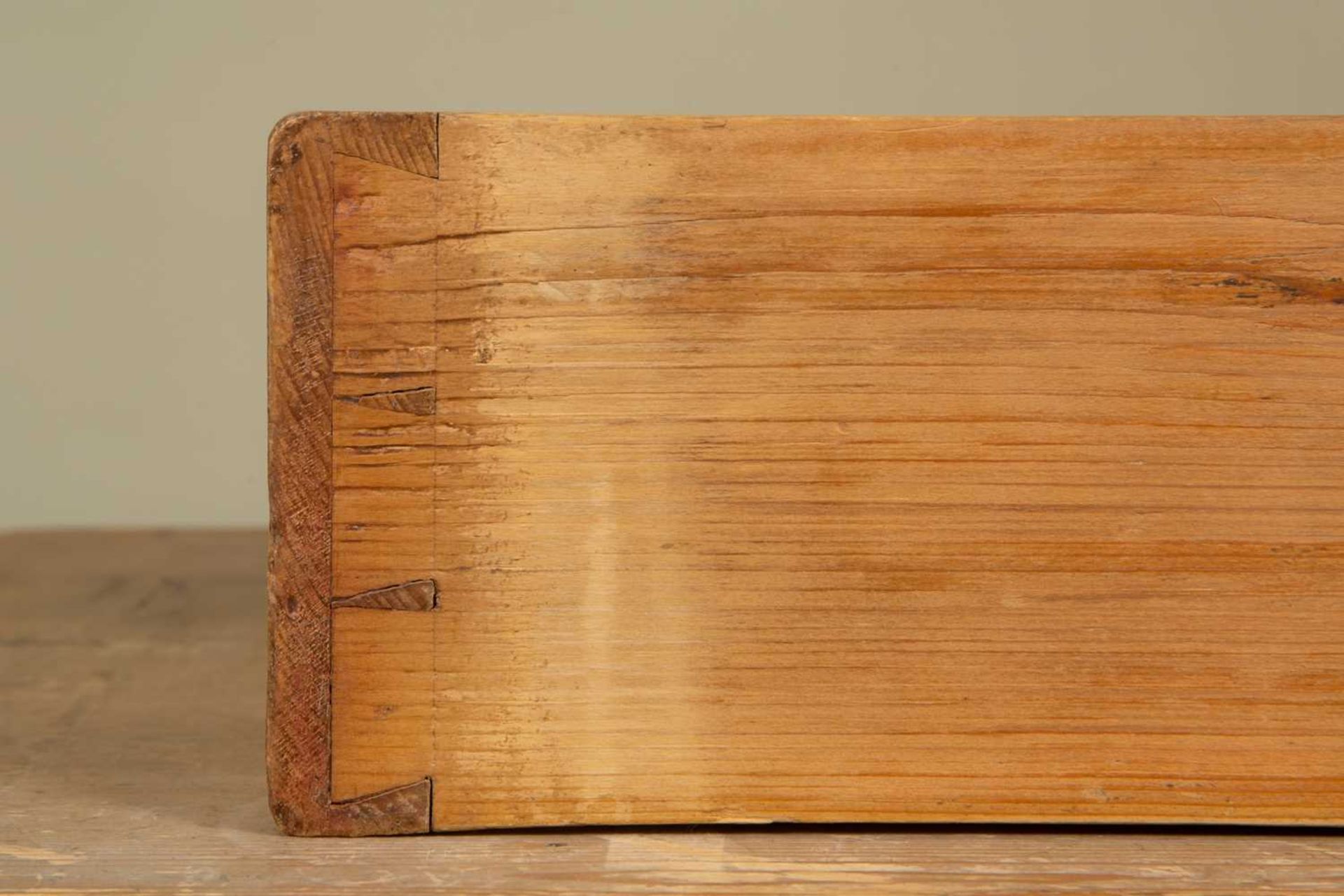 A small pine chest with four drawers, with brass inset handles on plinth base, 62cm wide x 46cm deep - Image 5 of 5