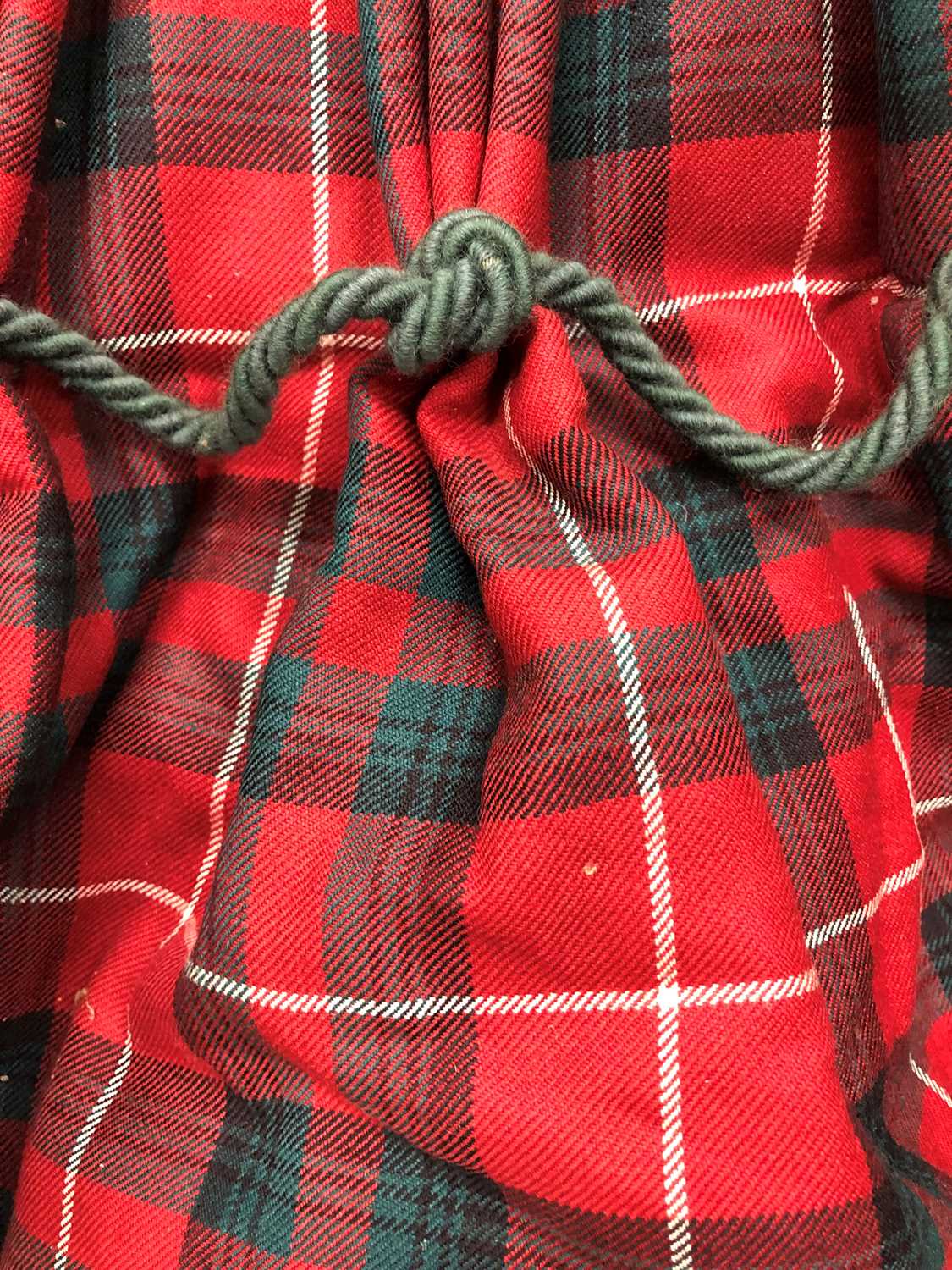 A pair of interlined tartan curtains and matching pelmet, each curtain 260cm wide, 230cm high (3)