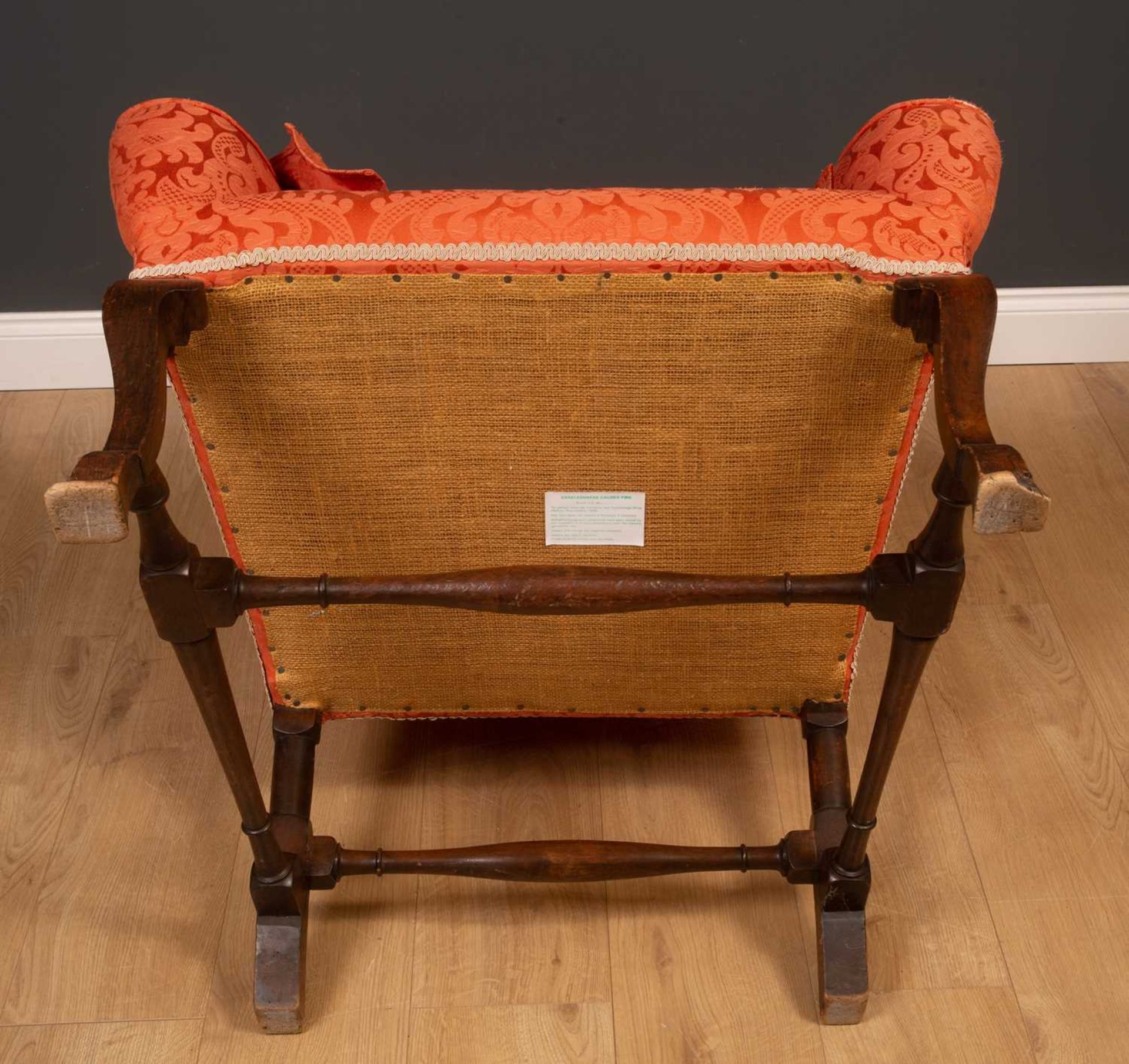 A Georgian mahogany high wingback armchair on scrolling supports united by an H-frame stretcher, - Image 5 of 5