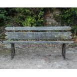 An old garden bench with cast iron ends, with wooden back and seat, 183cm long, 44cm deep, 79cm
