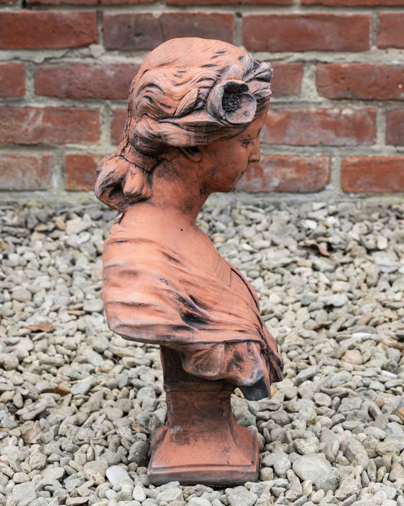 A cast terracotta sculpture depicting a young girl with roses in her hair, 47cm high - Image 2 of 3