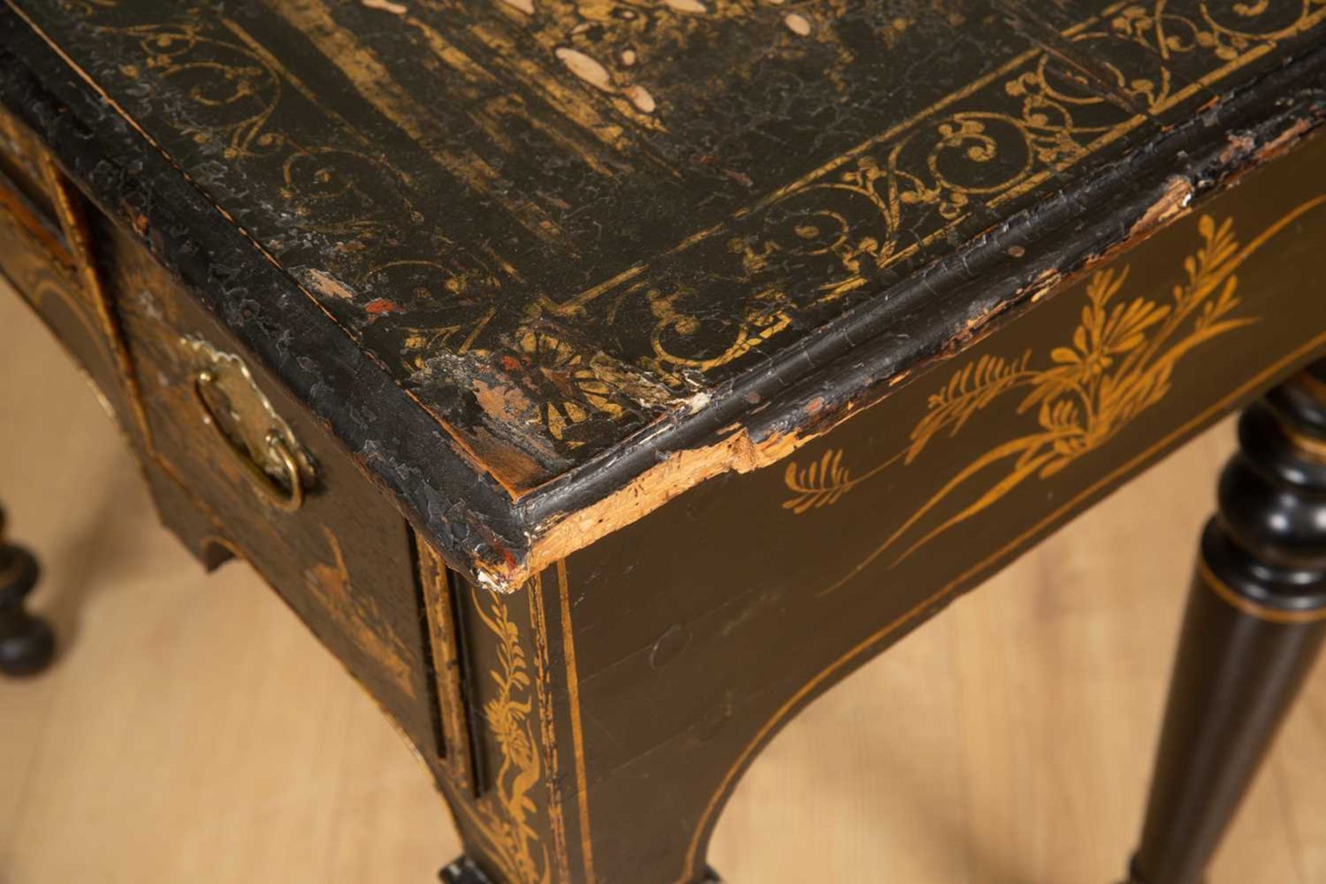 An early 18th century and later black lacquered chinoiserie decorated lowboy, with village and - Image 4 of 7