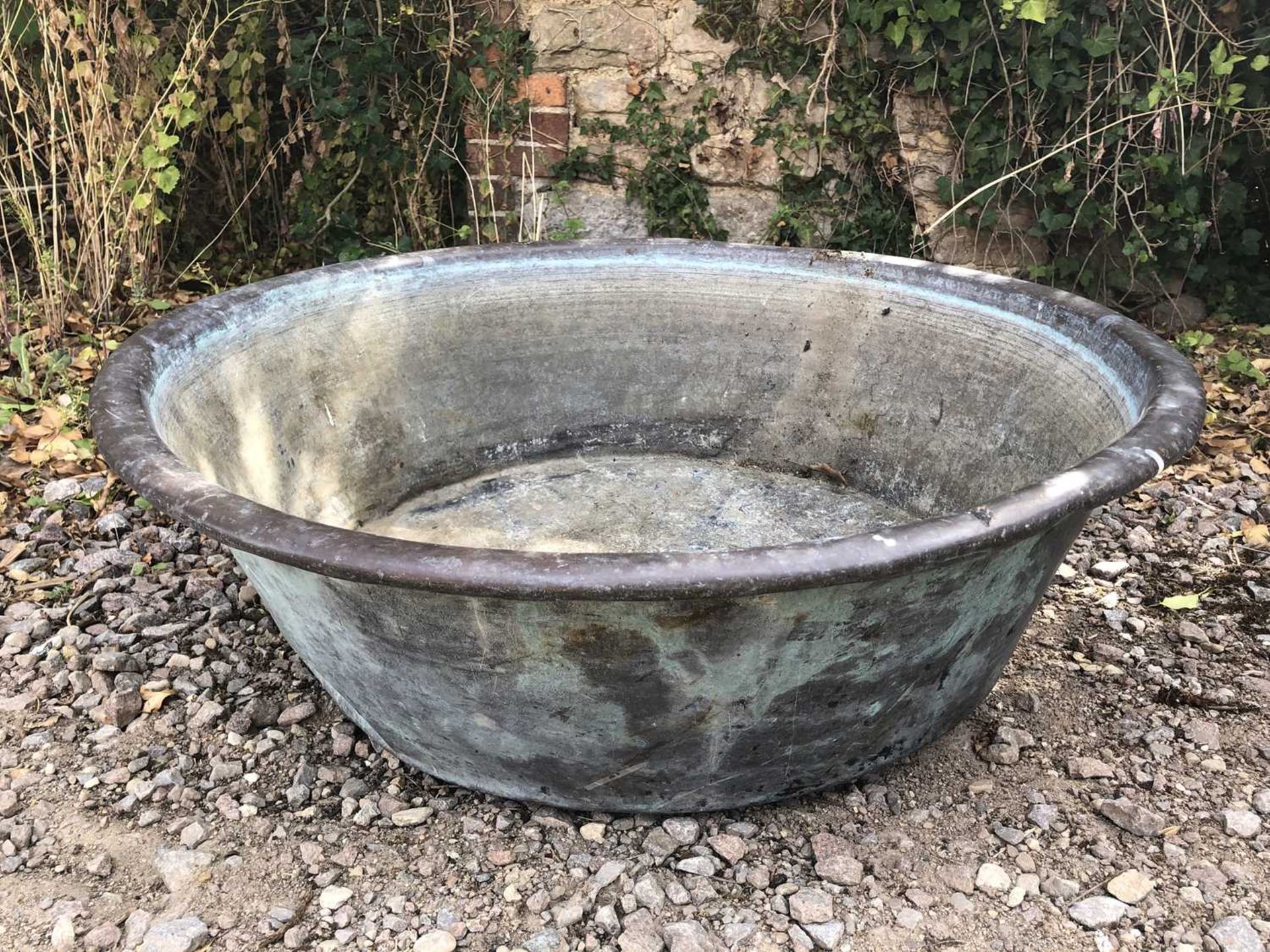 An old circular copper basin, 83cm diameter x 24cm highSome dents and marks overall, and oxidisation - Image 4 of 4