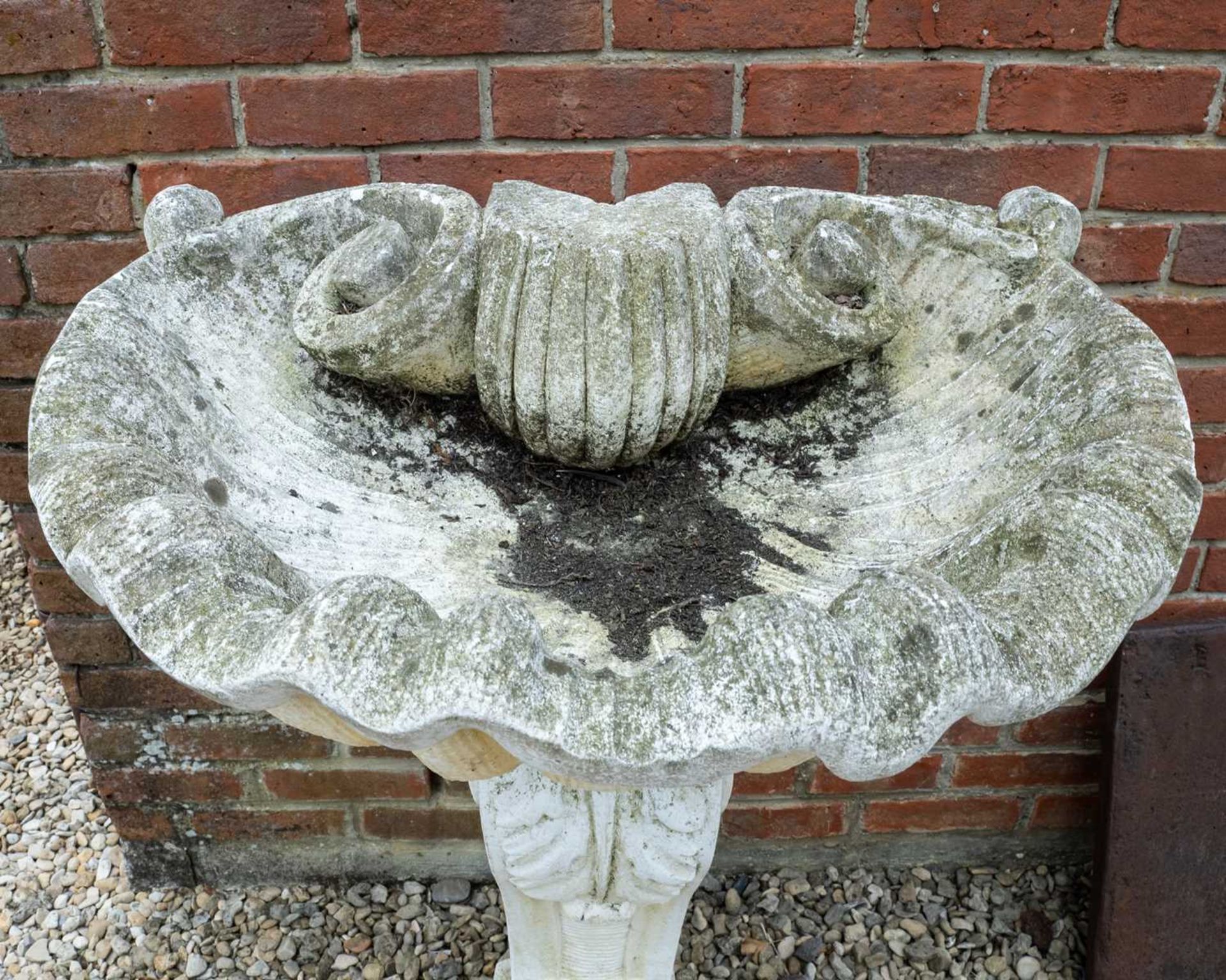 A cast reconstituted stone wall fountain in the form of a large shell on supporting pedestal with - Image 3 of 3