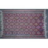 A group of five decorative Turkish flat weave rugs the largest 132cm x 206cmNo major damages, some