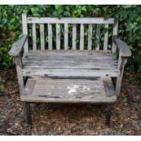 A small teak garden bench with flat arms, 132cm wide x 89cm high together with a small teak