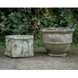 A circular cast reconstituted stone garden planter with banded ornament, 53cm diameter x 43cm
