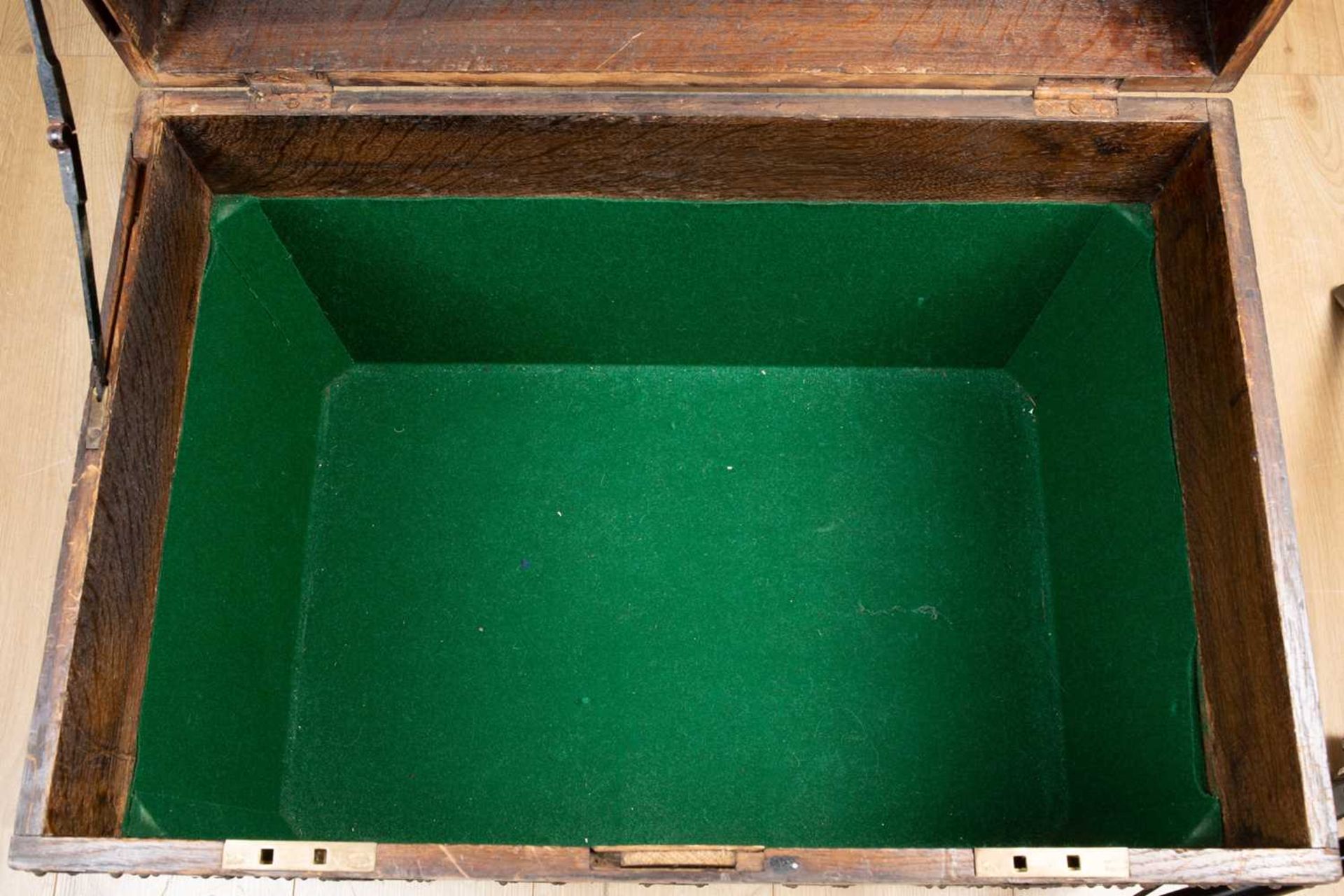 An antique oak iron-bound oak silver chest with carrying handles to the side, the baize lined - Image 4 of 4