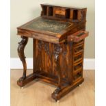 A William IV laburnum wood davenport desk, with Gothic blind tracery panels to the front and back,