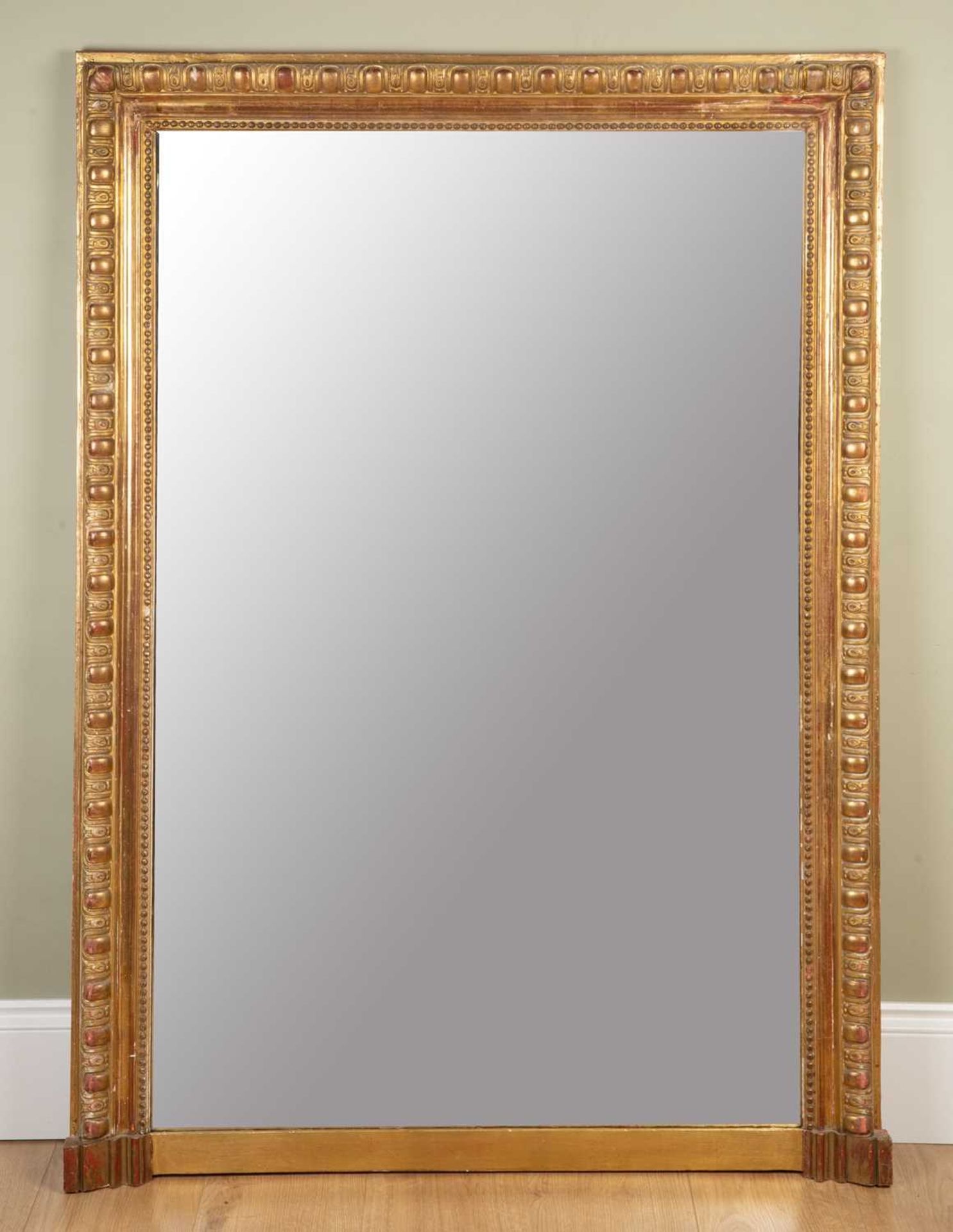 A giltwood framed rectangular over mantle mirror, with egg and dart border, 96.5cm wide, 135.5cm