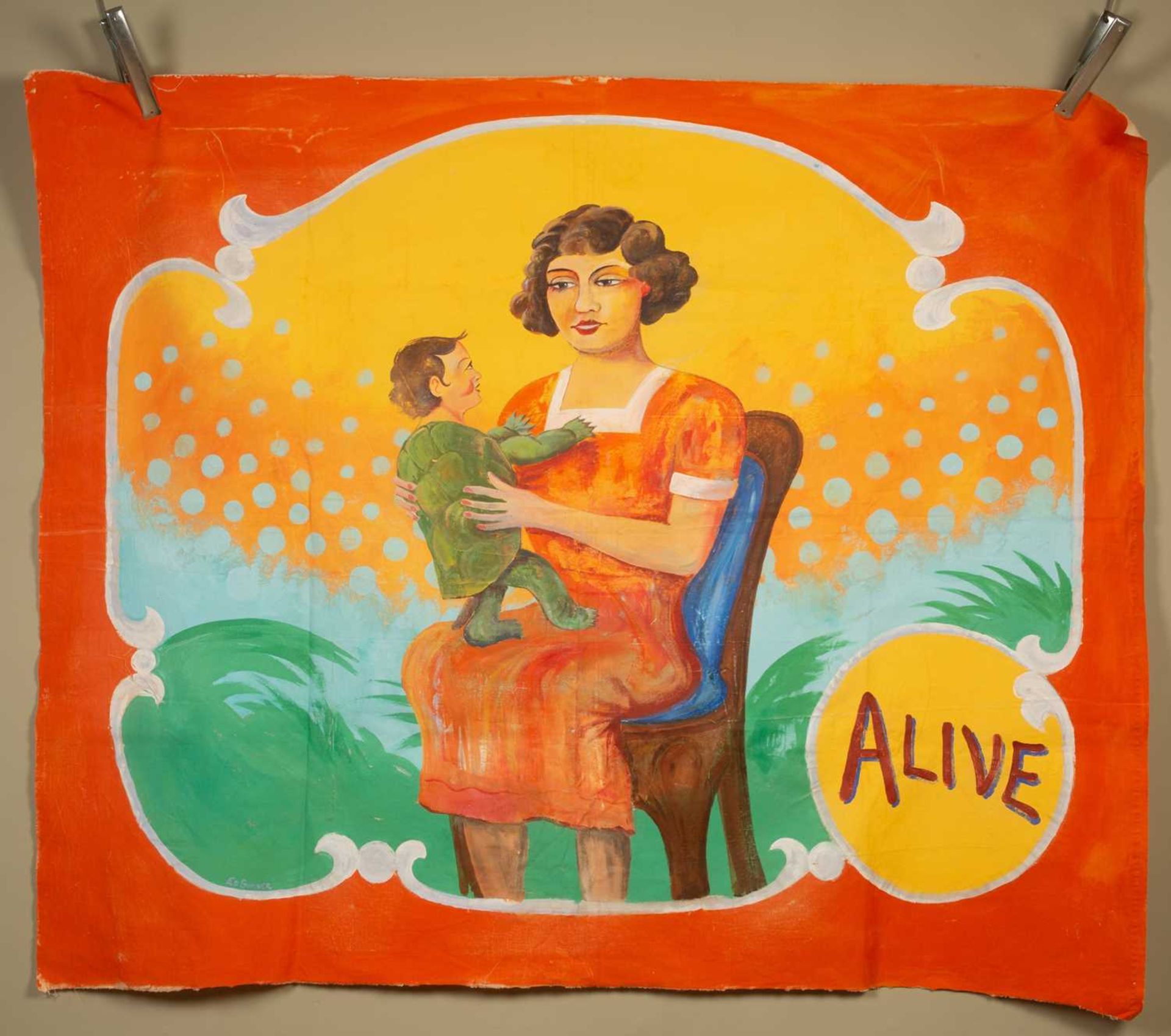 A painted canvas circus or fairground advertising sign for a Turtle Boy, "Alive", 127cm wide,