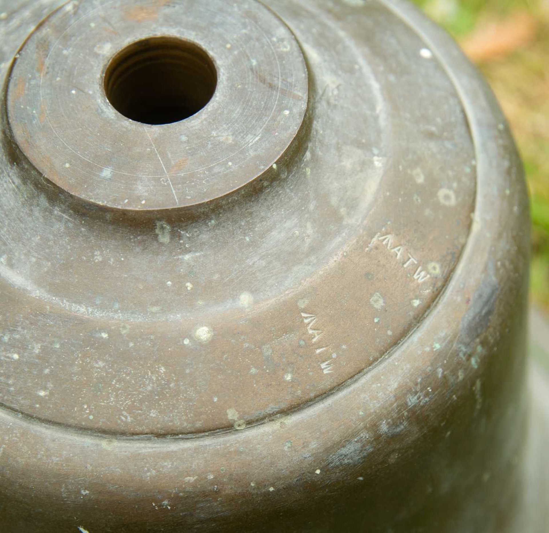 An old military bronze bell, stamped 'ATW', 27cm diameter, 22cm highOxidised but in generally good - Image 2 of 2