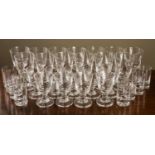 A vintage set of glasses, comprising thirteen red wine glasses, 15cm high, thirteen white wine
